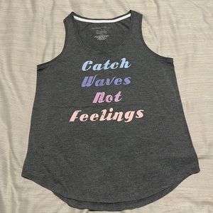 Women’s size small gray tank top (catch waves not feelings)